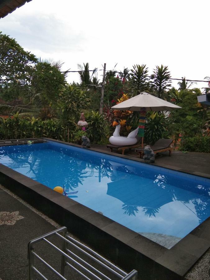 SunwuKong Guest House Ubud Extérieur photo